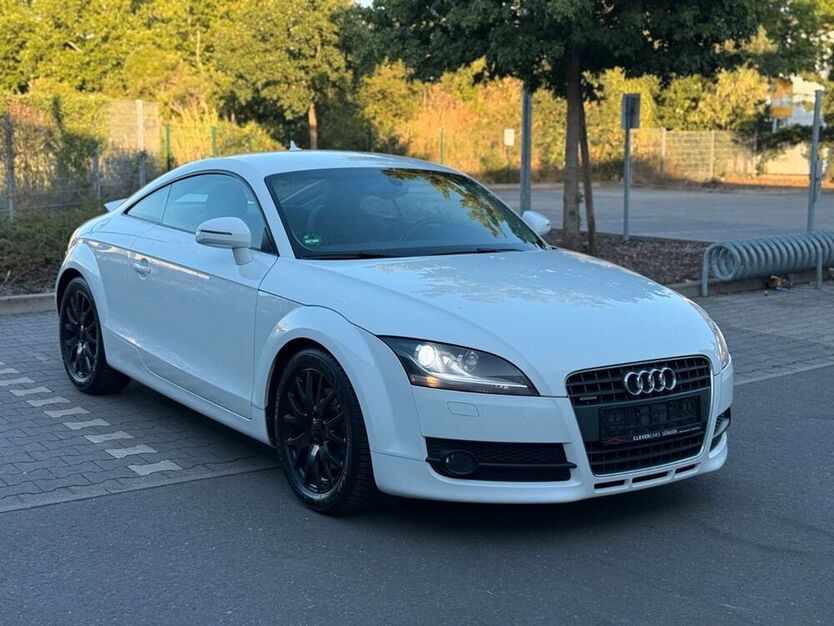 TT