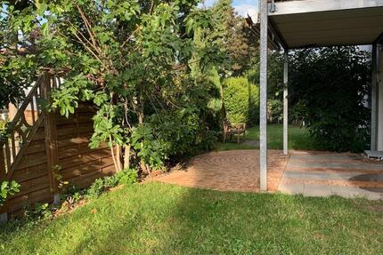 Attraktive 4-ZKB-Wohnung mit traumhaftem Garten und TG-Stellplatz