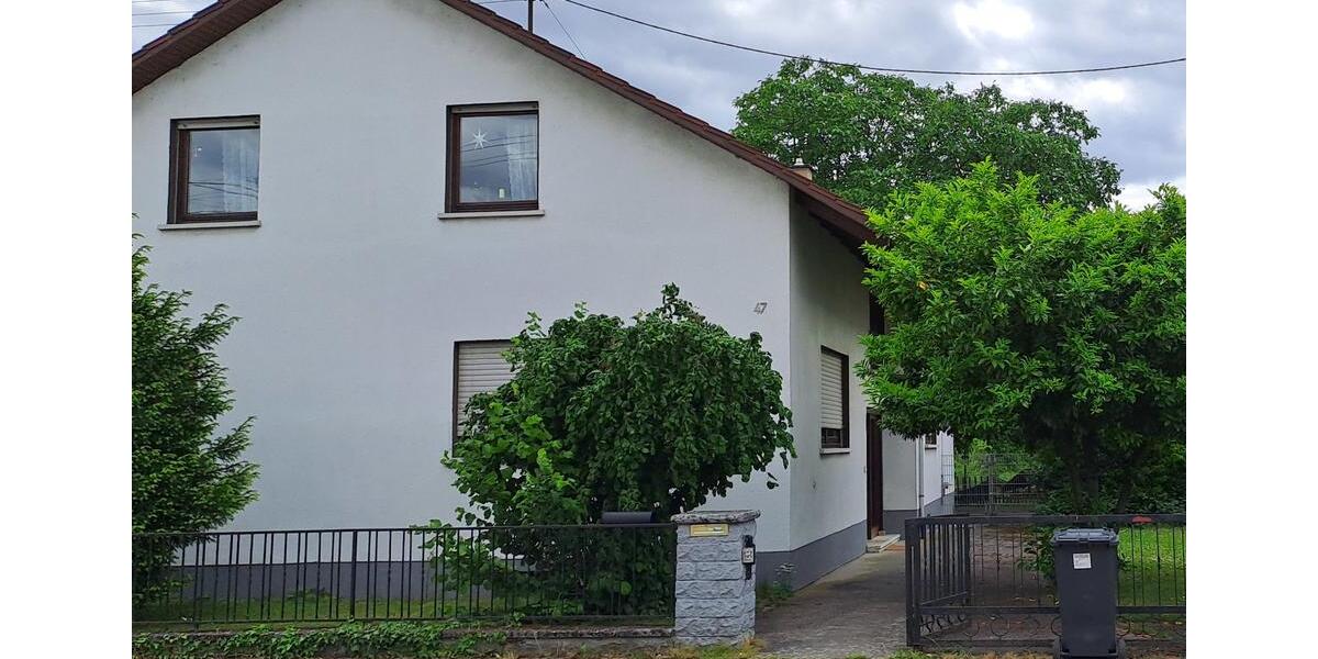 Großzügiges Haus mit großem Garten & Einliegerwohnung in Top-Lage zimmer
