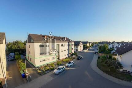 ATIK: Charmante 4-Zimmer-Erdgeschoßwohnung mit sonnigem Südbalkon in ruhiger Feldrandlage