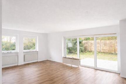 Exklusive 3 Zi.- EG-Wohnung mit großem Garten, Terrasse & Doppelgarage – LU 3 zimmer