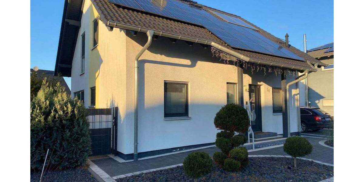 Modernes, freistehendes Einfamilienhaus in naturnaher Lage von Bürstadt - ideal für Familien 5 zimmer