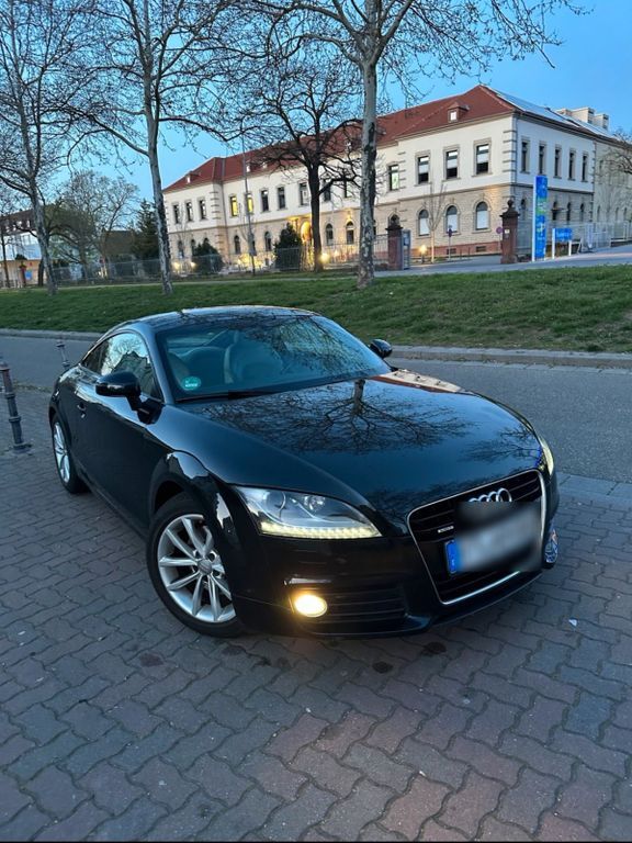 TT
