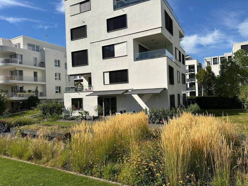 Traumhafte Erdgeschoss Terrassen Wohnung mit seitlichem Rheinblick