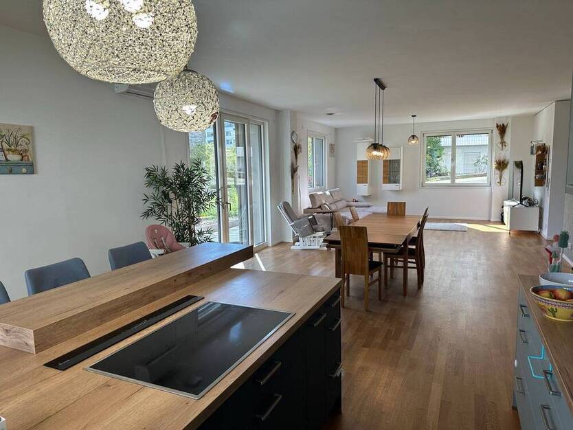 Traumhafte Erdgeschoss Terrassen Wohnung mit seitlichem Rheinblick