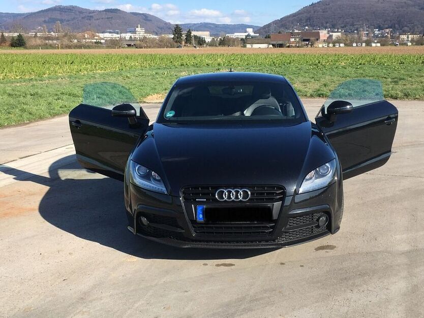 TT