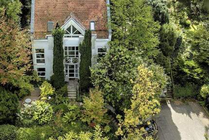 Außergewöhnliches Split-Level-Architektenhaus – Privatsphäre, Panorama & pure Lebensqualität 7 zimmer