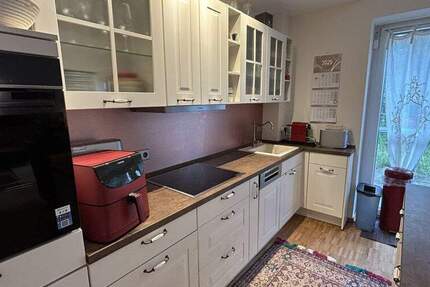 BIETERVERFAHREN - PROVISIONSFREI für Käufer - Moderne 2-Zimmer-Wohnung mit Terrasse und Garage 2 zimmer