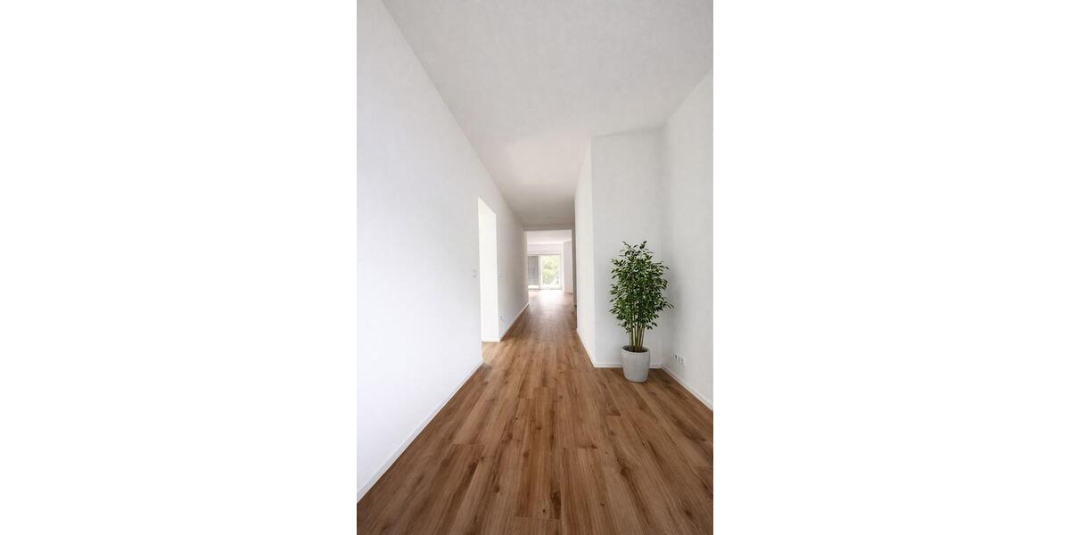 Exklusive 3 Zi.- EG-Wohnung mit großem Garten, Terrasse & Doppelgarage – LU 3 zimmer