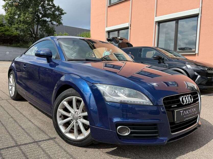 TT