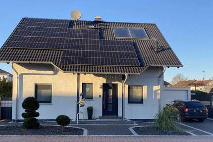 Modernes, freistehendes Einfamilienhaus in naturnaher Lage von Bürstadt - ideal für Familien 5 zimmer