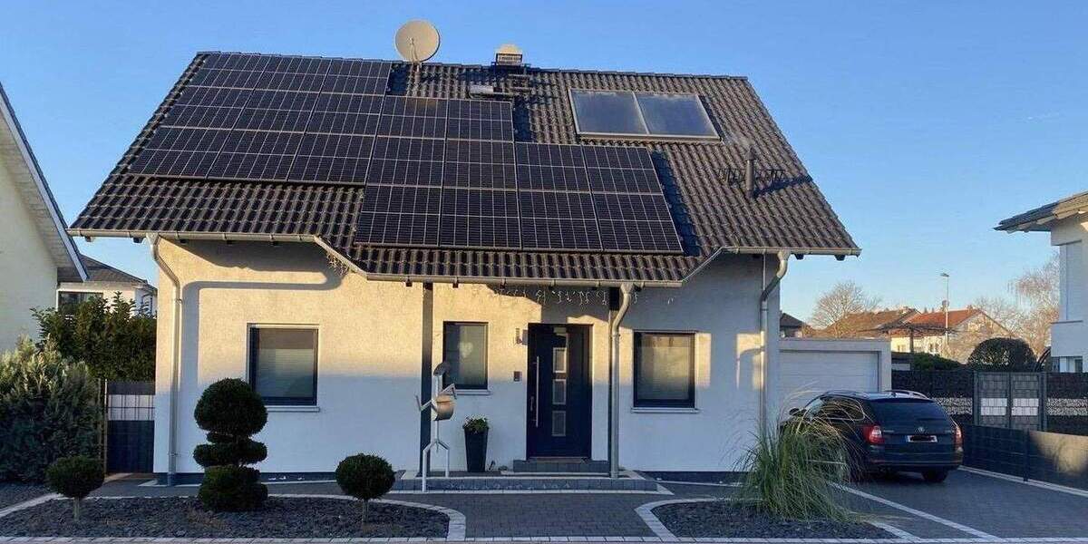 Modernes, freistehendes Einfamilienhaus in naturnaher Lage von Bürstadt - ideal für Familien 5 zimmer