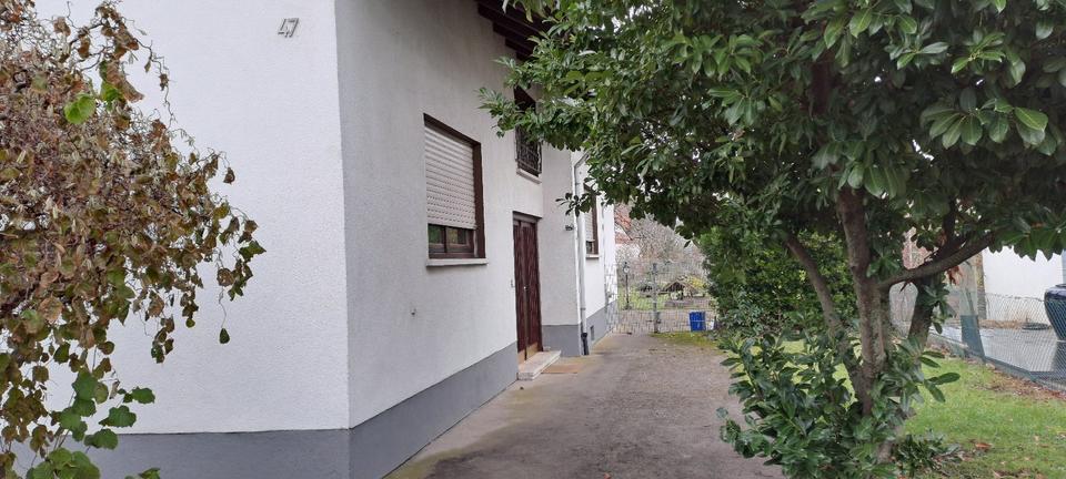 Großzügiges Haus mit großem Garten & Einliegerwohnung in Top-Lage zimmer